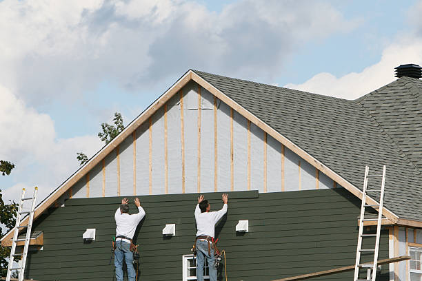Professional Storm Damage Siding Repair technician working in Marion, CT